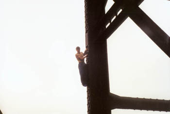 me climbing an old railroad bridge