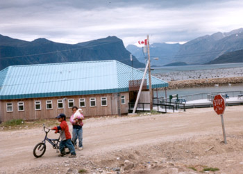 kids with puppy and bicycle