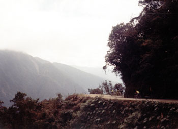 bicycling on the clifftop road cut, Bolivia