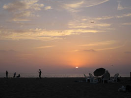 Dockweiler Beach sunset with airplane