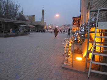 pomegranate presses, mosque beyond - Kashgar